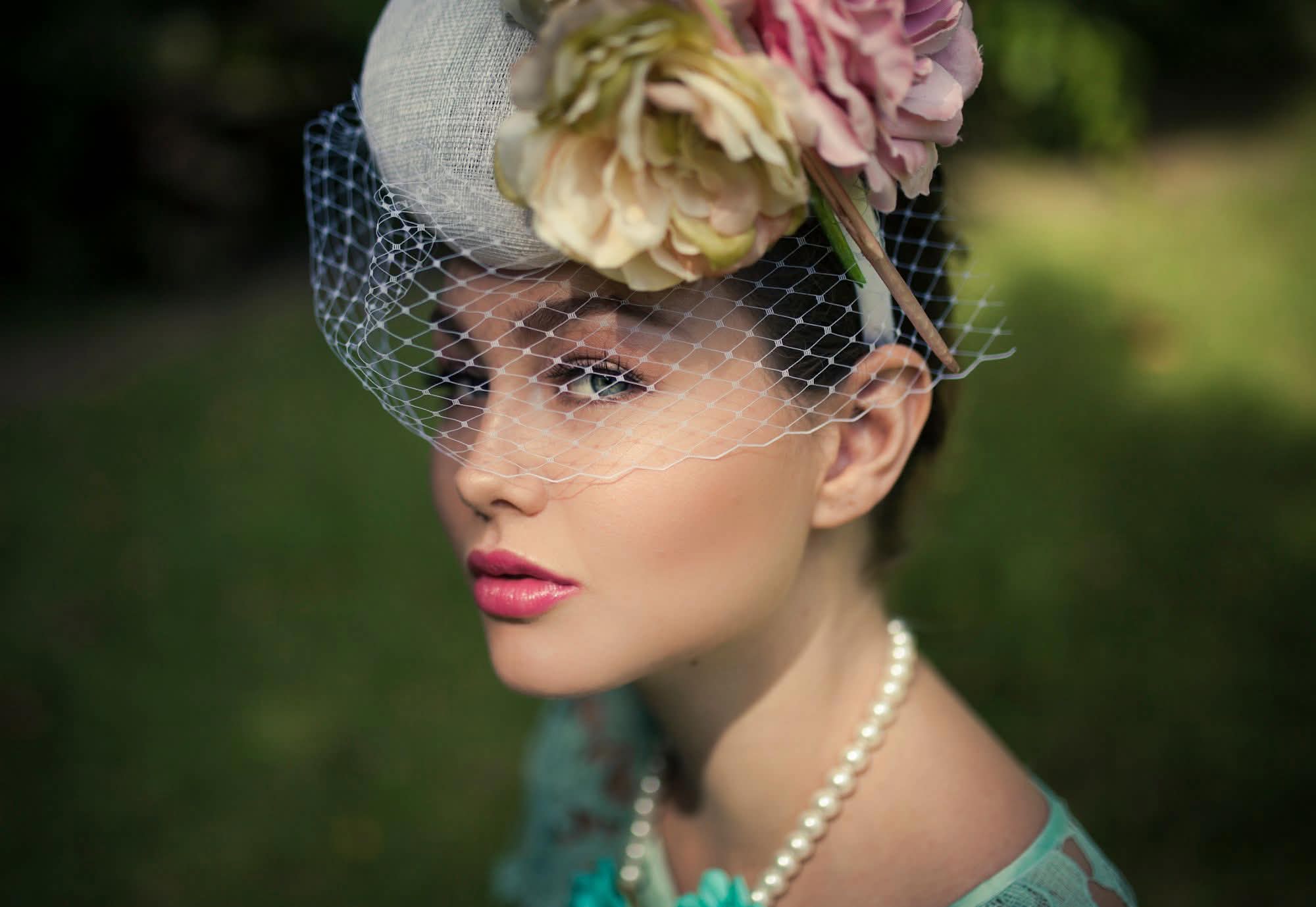 Editorial bridal makeup by Maria Morrison with veil and floral headpiece in Cairns